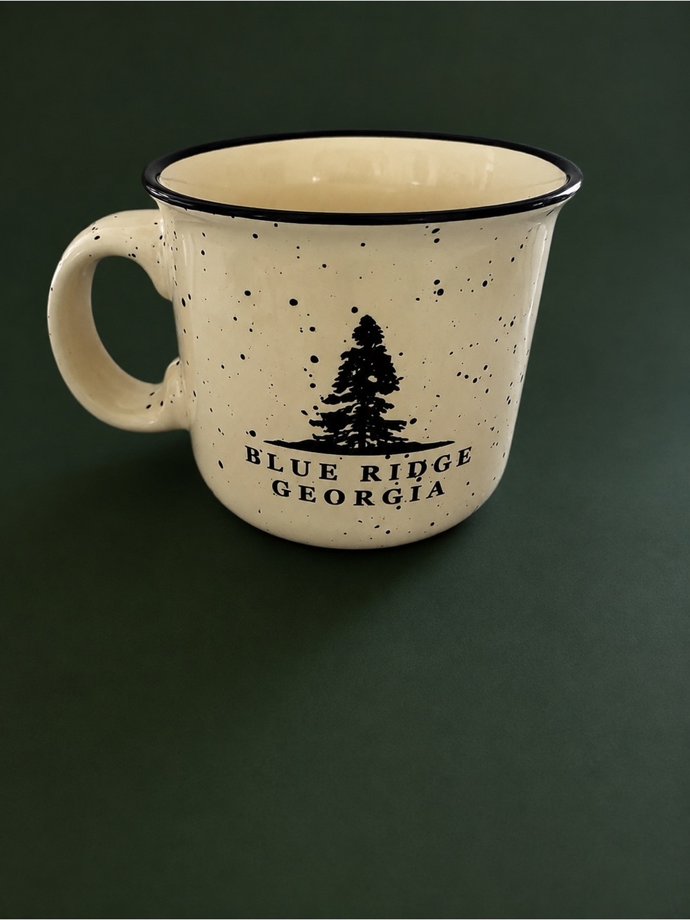 Huck’s General Store, Blue Ridge Georgia 
Ceramic, Speckled Mug with Black Rim 🤎